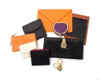 An Assortment Leather Items,
