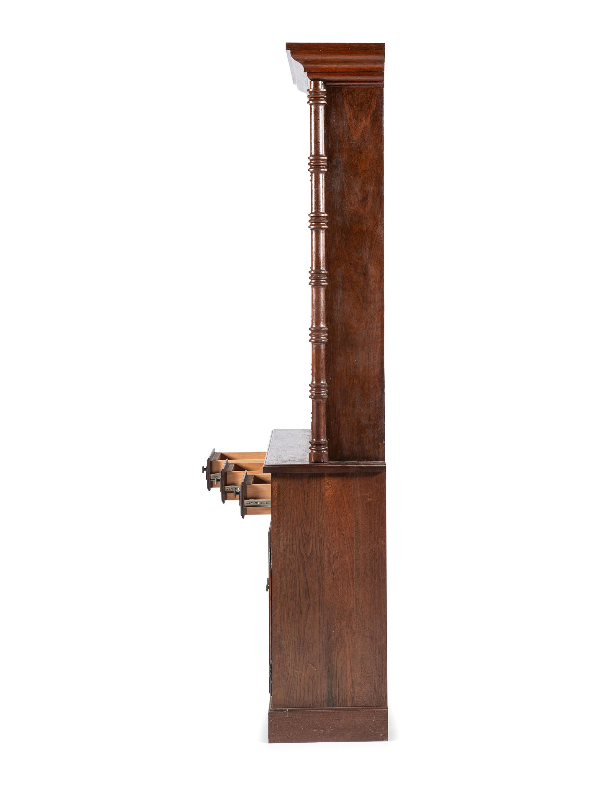 An Oak Stepback Barbershop Cabinet