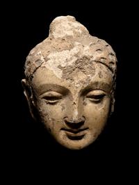 Two Gandharan Fragmentary Stucco Heads
