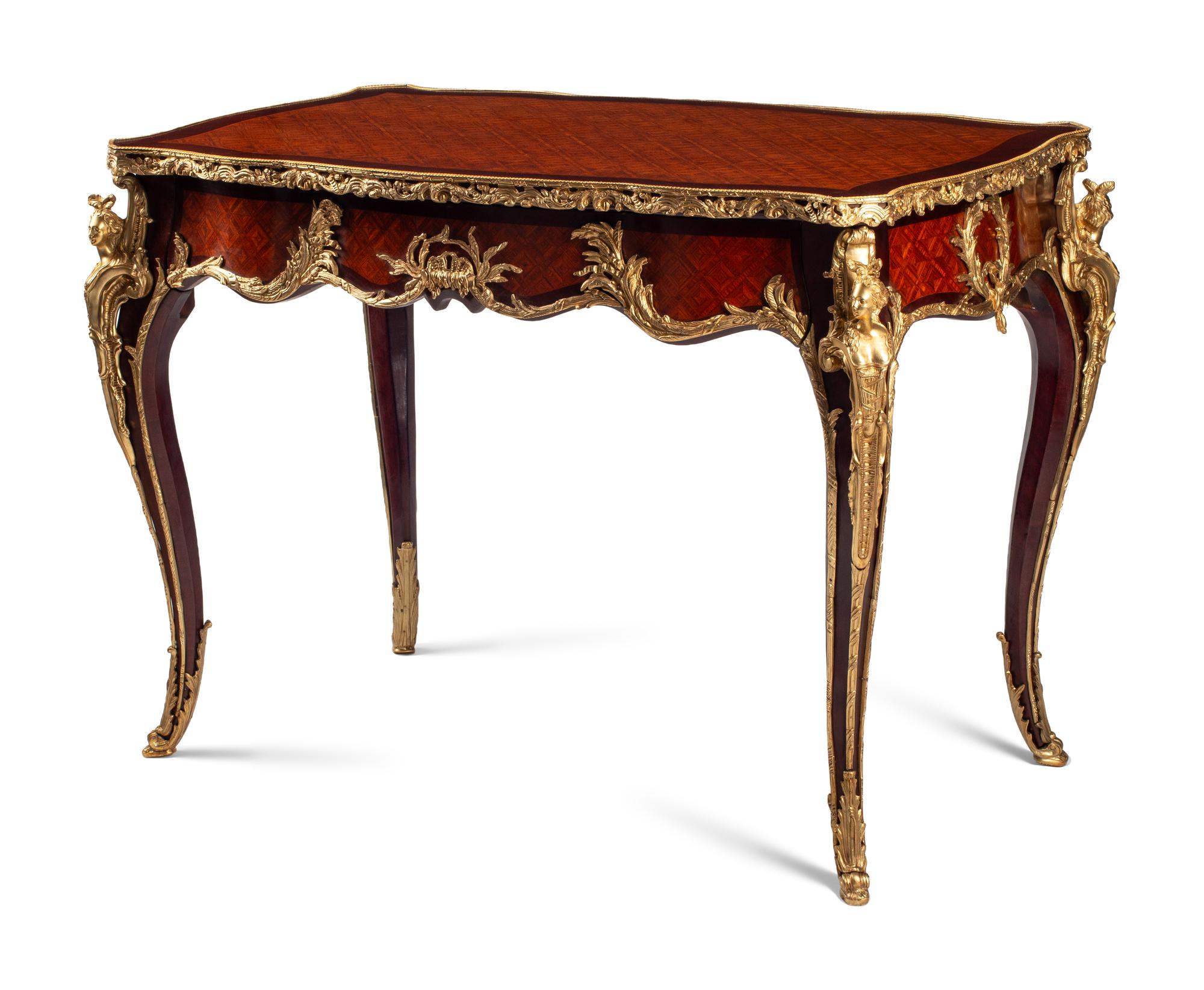 A Louis XV Style Gilt Bronze Mounted Parquetry Bureau Plat
