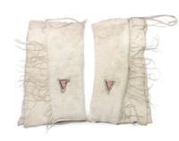 Two Pairs of Blackfeet Quilled Leggings Length of first 33 1/2 inches.