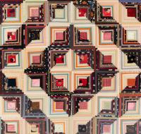 A Log Cabin Pattern Pieced Silk and Satin Quilt