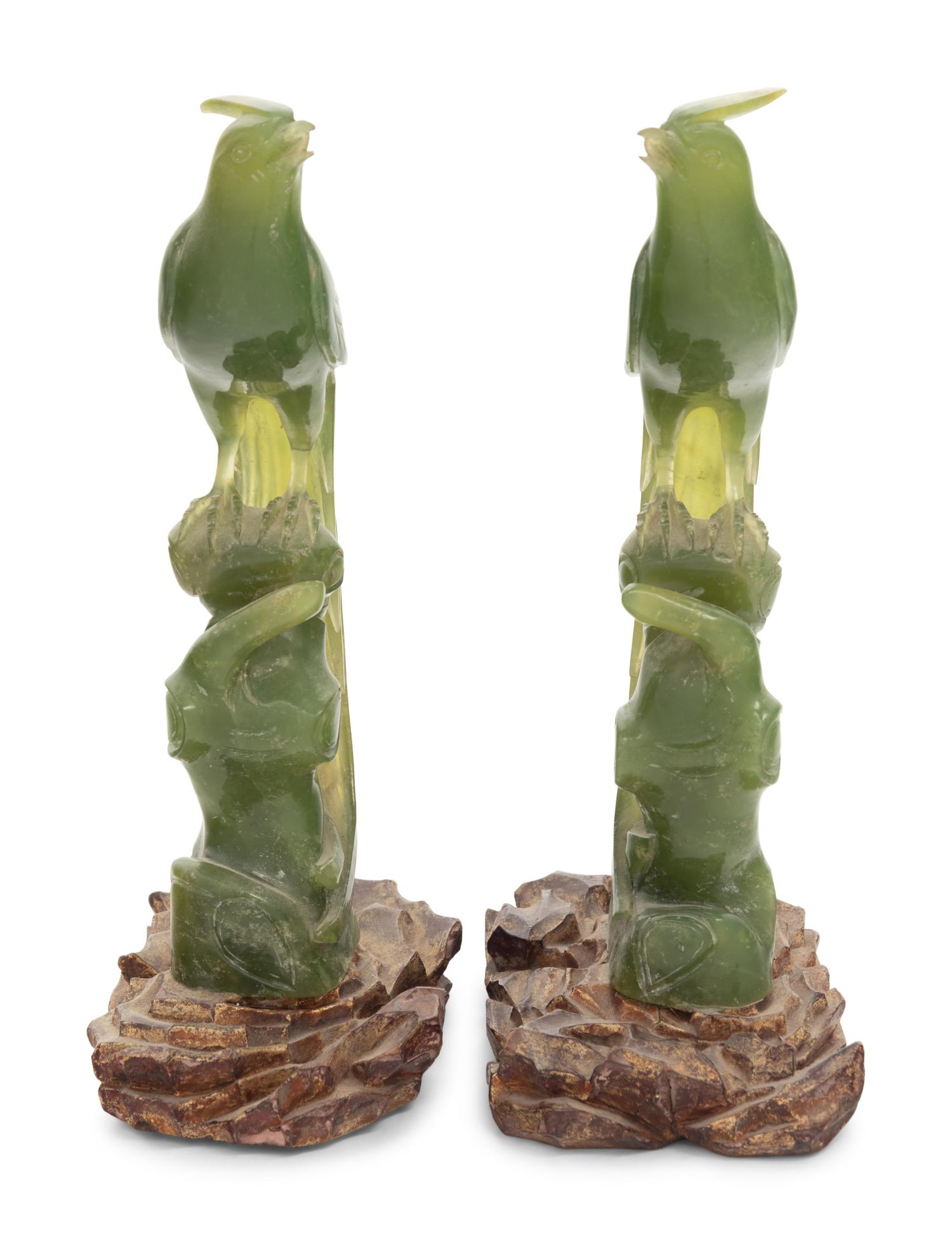 A Pair of Carved Serpentine Bird Figures