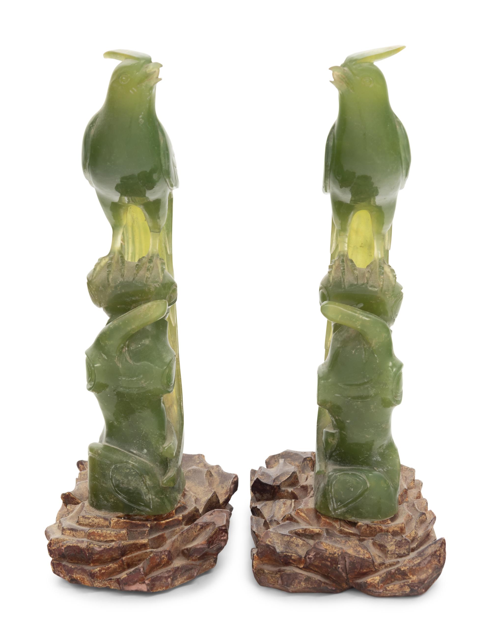 A Pair of Carved Serpentine Bird Figures