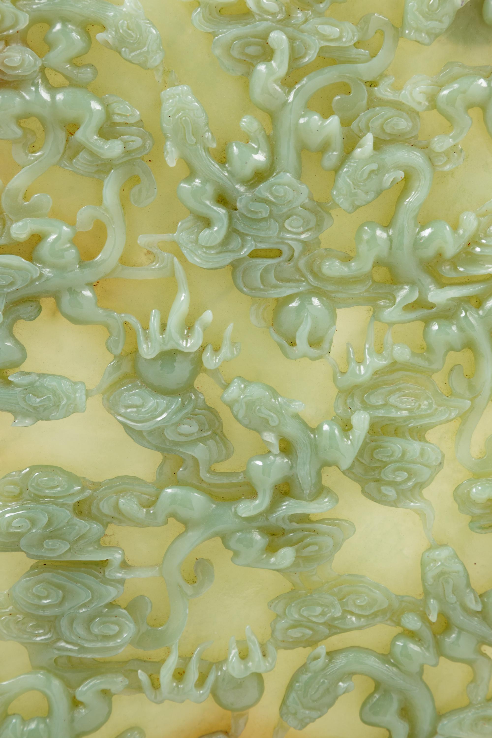A Chinese Yellow Celadon Jade 'Chilong' Table Screen