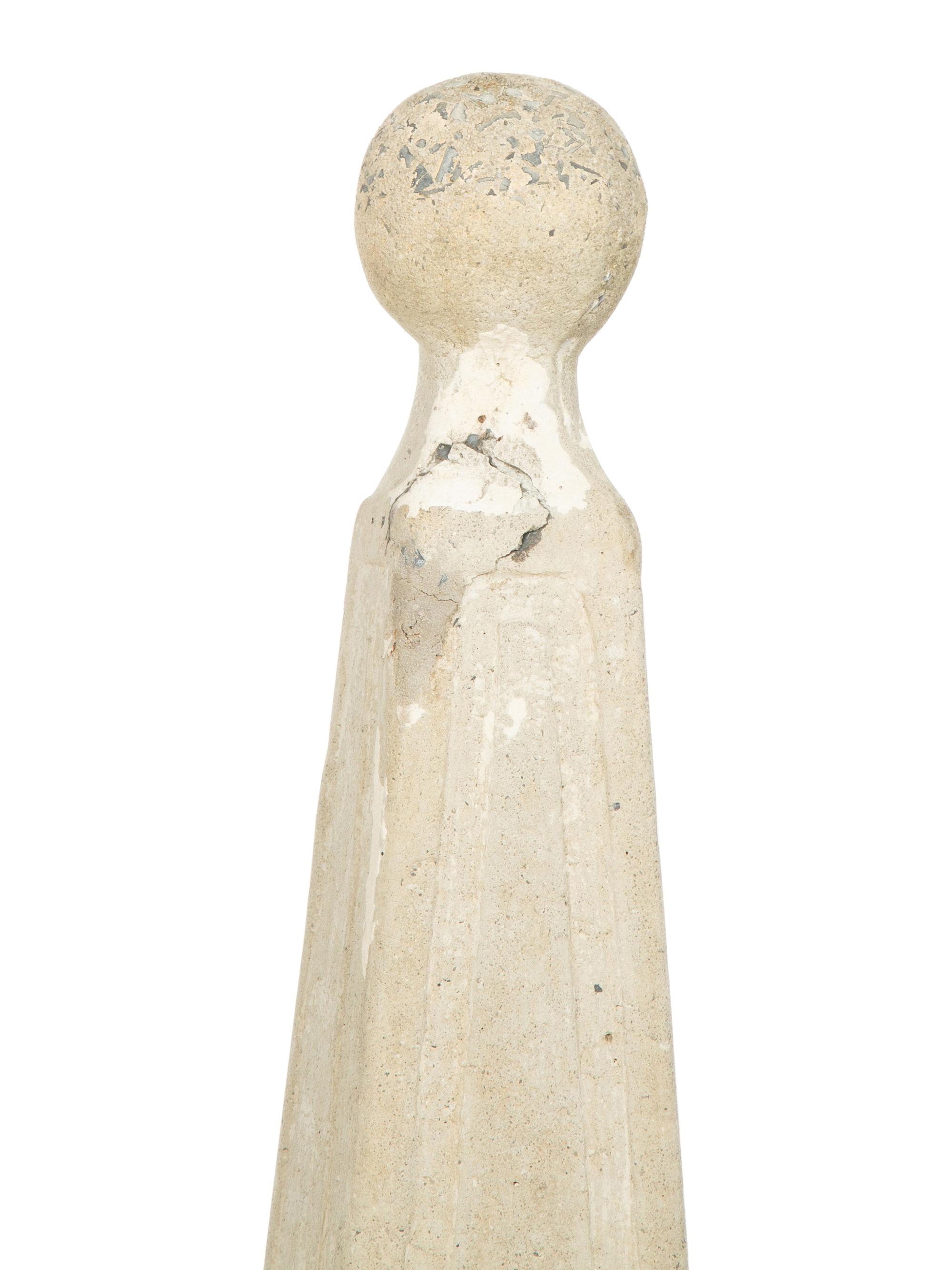 A Set of Four Cast Stone Obelisks