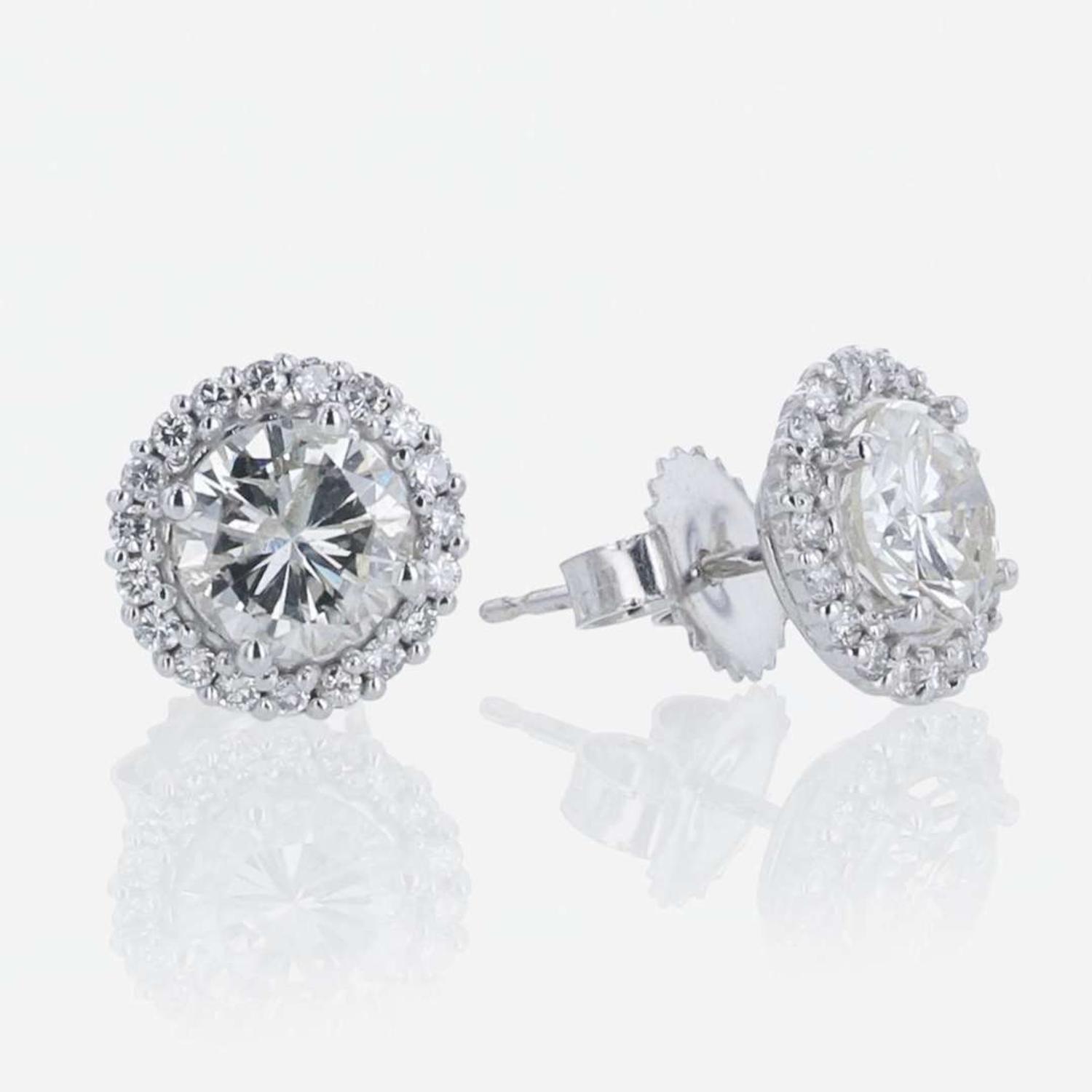 A Pair of 18K White Gold Halo Diamond Stud Earrings