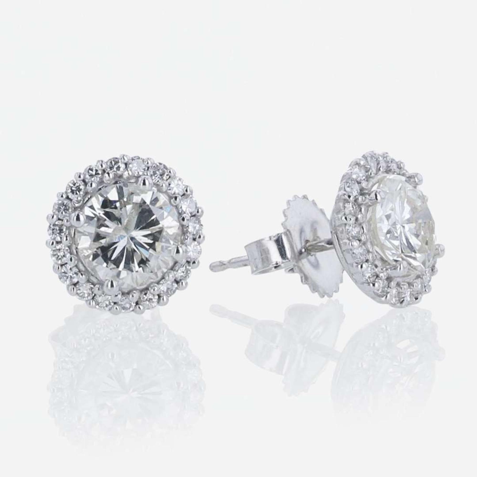 A Pair of 18K White Gold Halo Diamond Stud Earrings