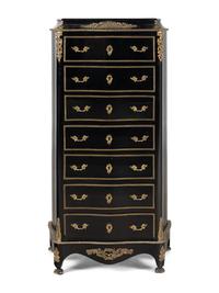 A Napoleon III Style Gilt Bronze Mounted Ebonized Semainier
