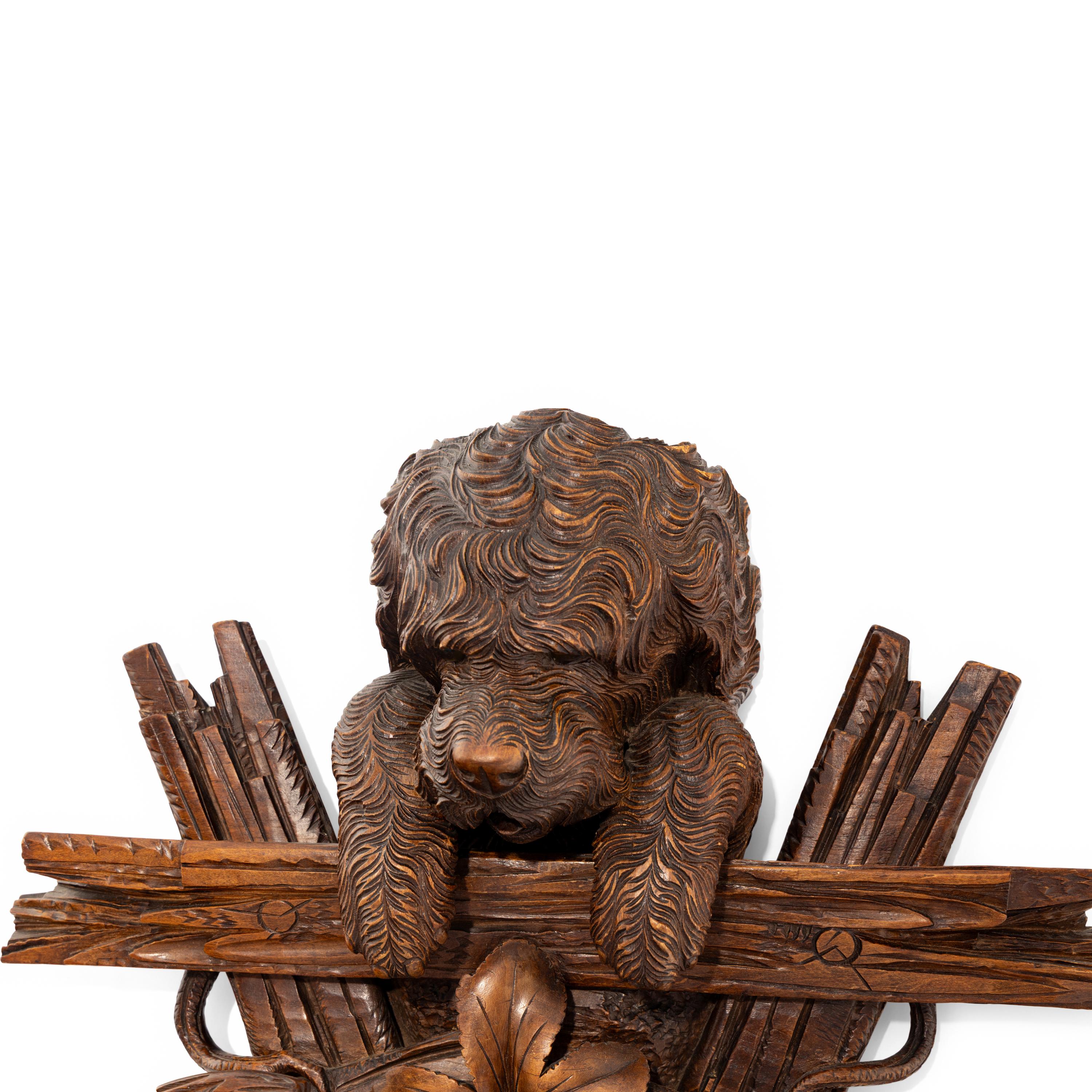 A Swiss "Black Forest" Carved Figural Coat Hook