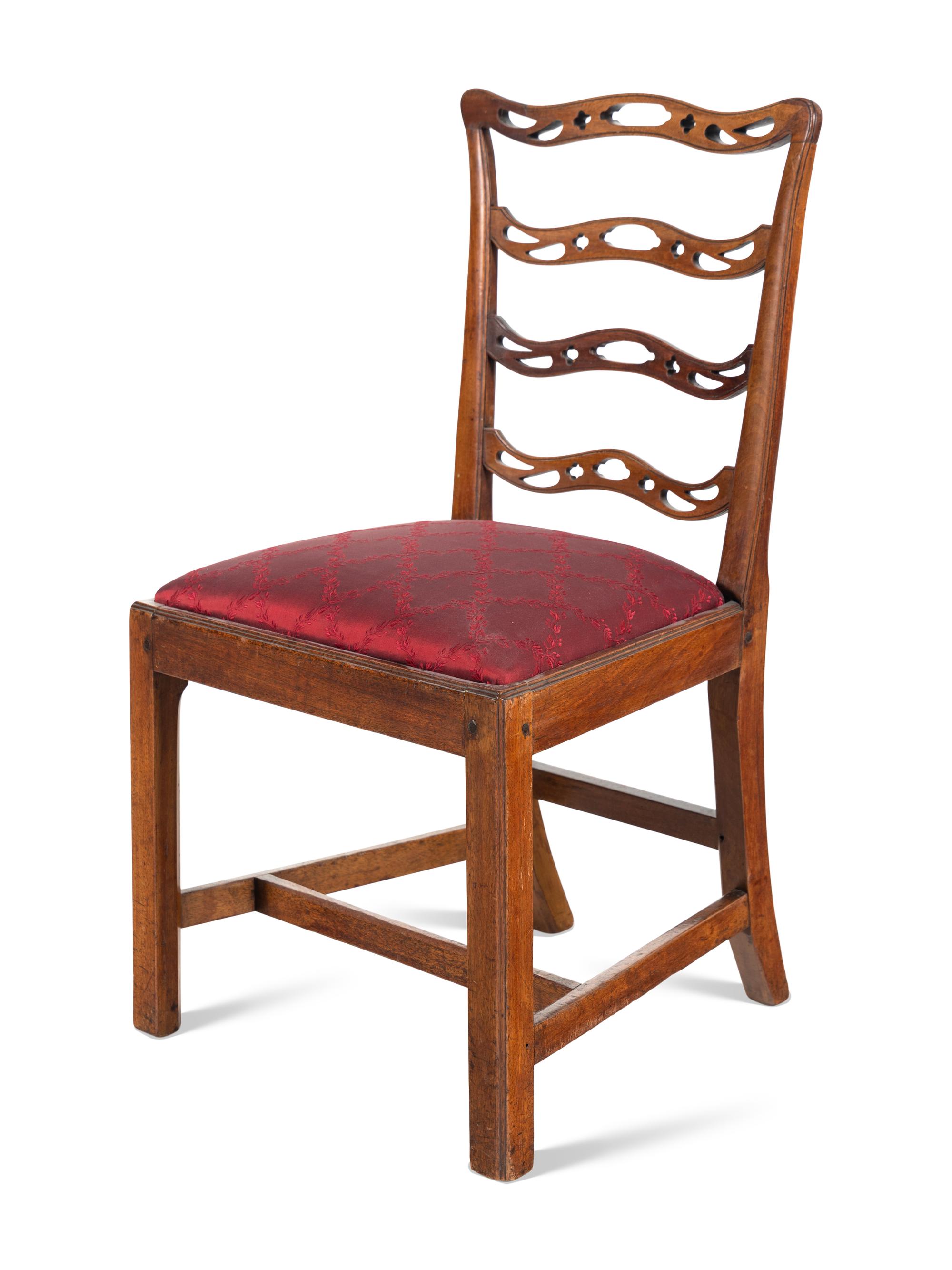 A Set of Six Federal Pierced and Carved Mahogany Dining Chairs