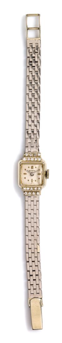 An 18 Karat White Gold and Diamond Wristwatch, Bucherer, 21.40 dwts.