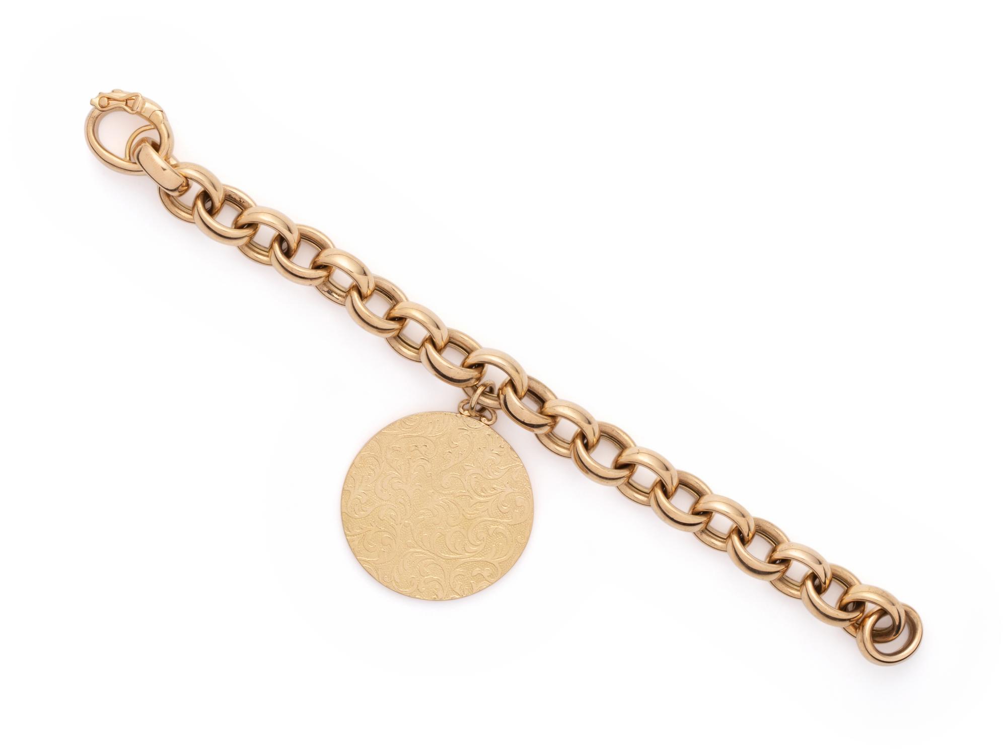 MONICA RICH KOSANN, YELLOW GOLD 'MARILYN' BRACELET AND 'VINE HALF LOCKET'