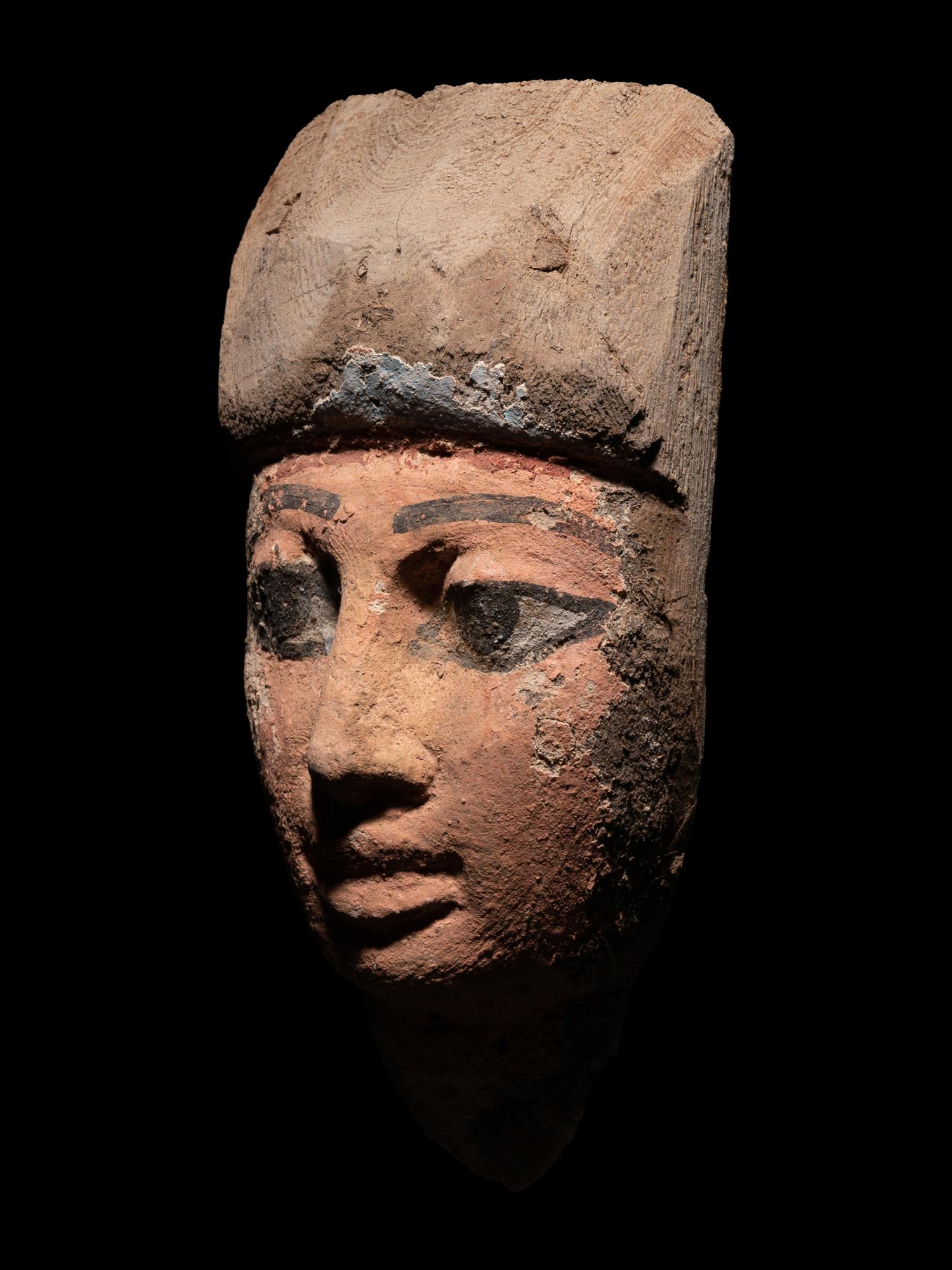An Egyptian Wood Mummy Mask