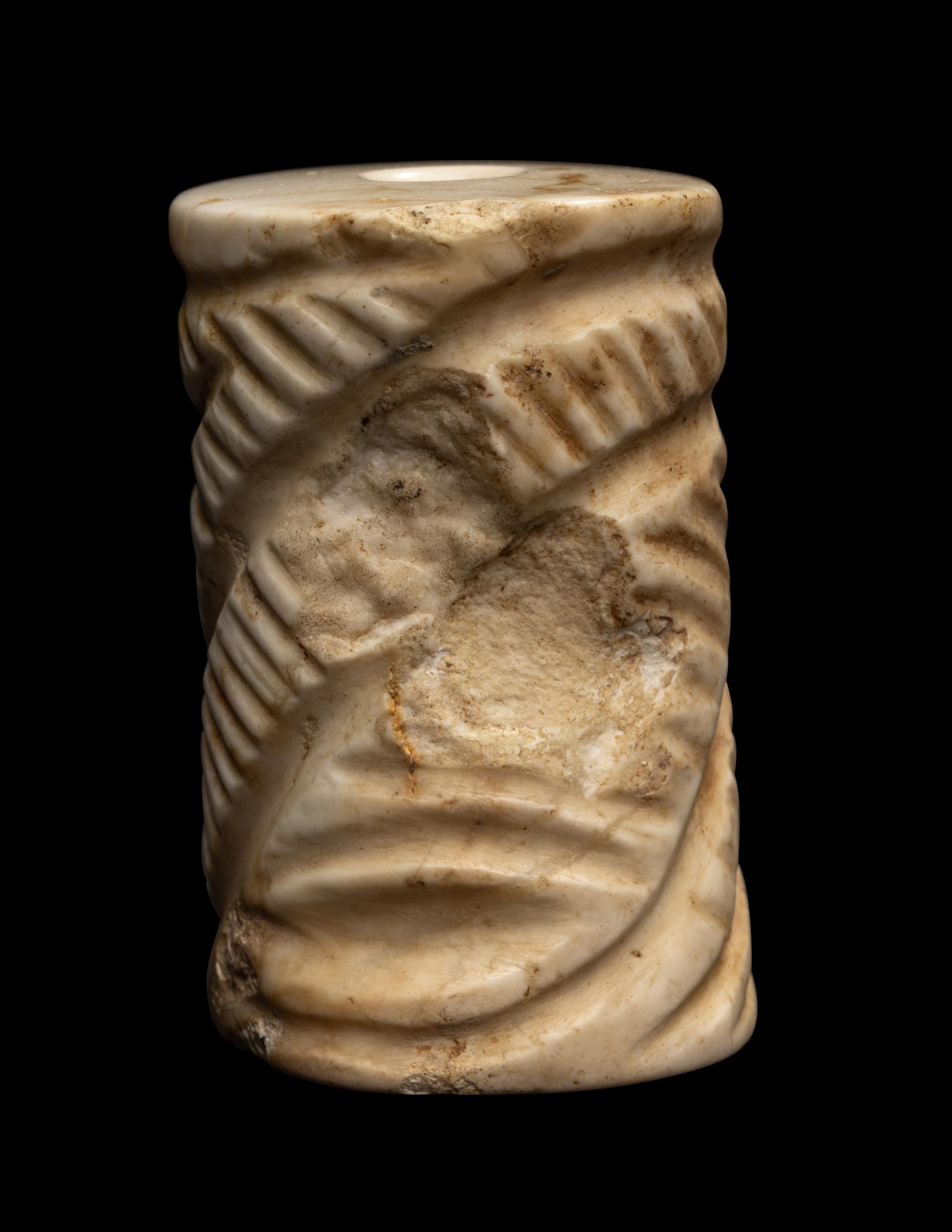 A Mesopotamian Limestone Cylinder Seal