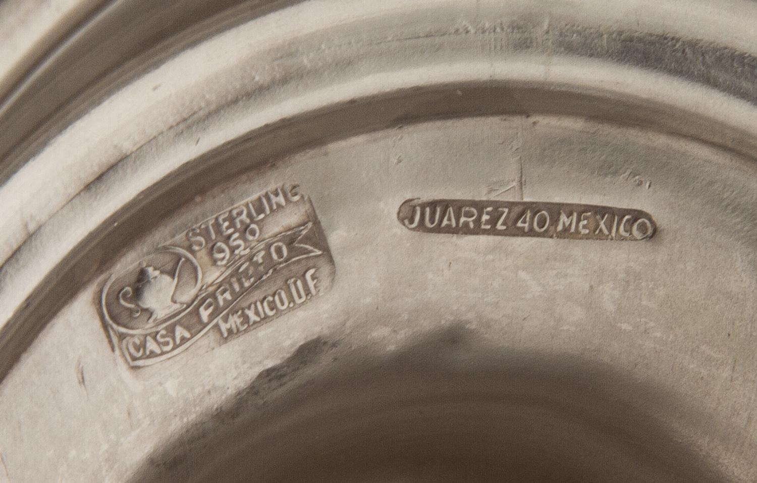 A Set of Four Mexican Silver Candlesticks, Casa Prieto, Mexico City, 1960s, each with a knopped baluster stem.