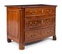 A Régence Gilt Metal Mounted Carved Walnut Serpentine Commode