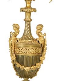A Pair of French Gilt Bronze and Marble Urn-Form Six-Light Candelabra
