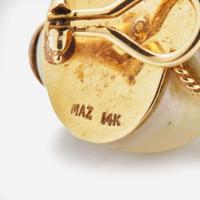 A Group of Shell-Themed Gold Earrings