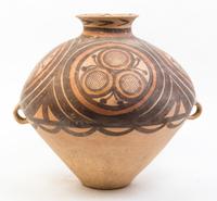 A Large Neolithic Style Pottery Jar Height 16 inches.