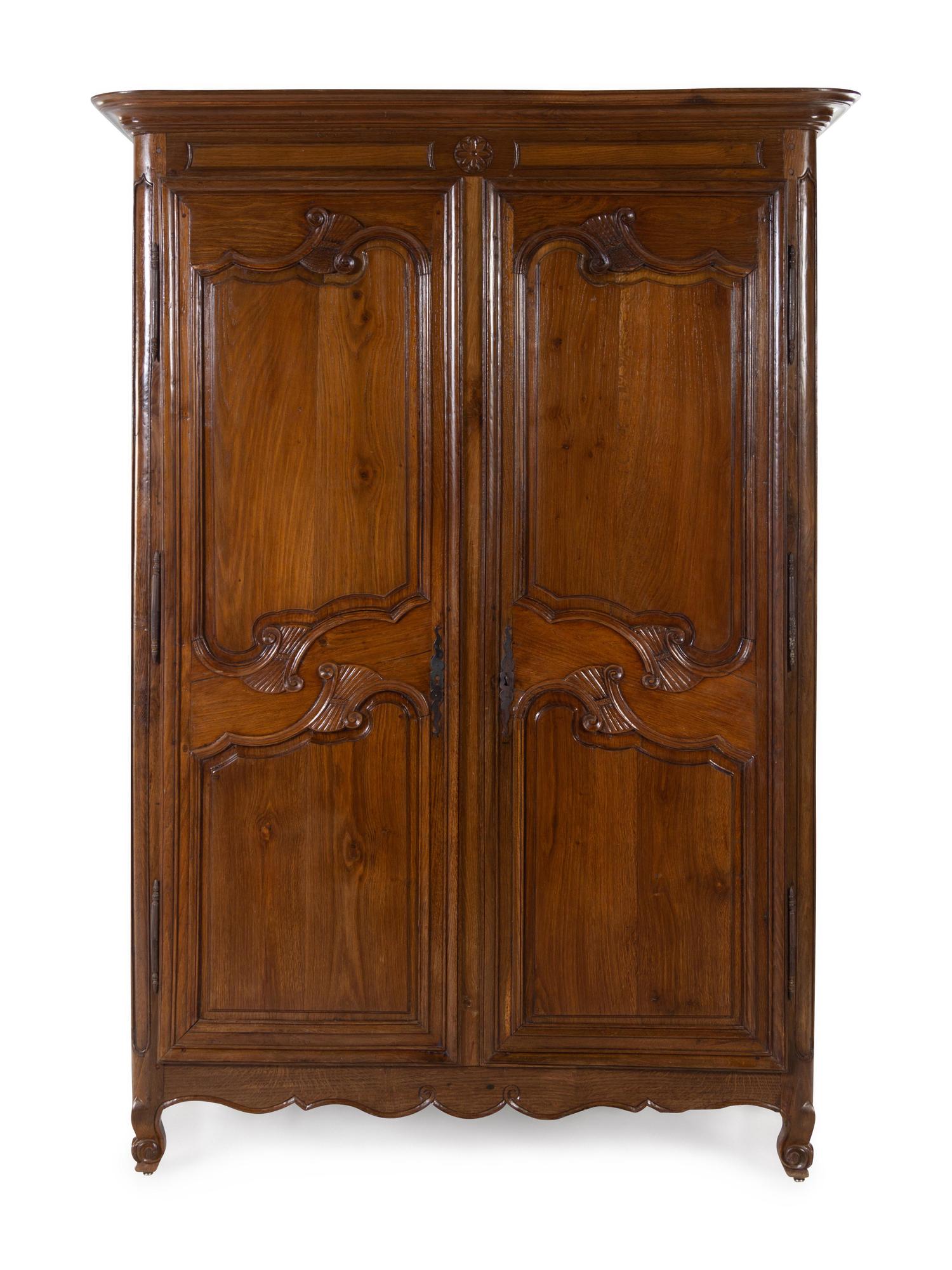 A French Provincial Walnut Armoire