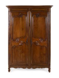 A French Provincial Walnut Armoire