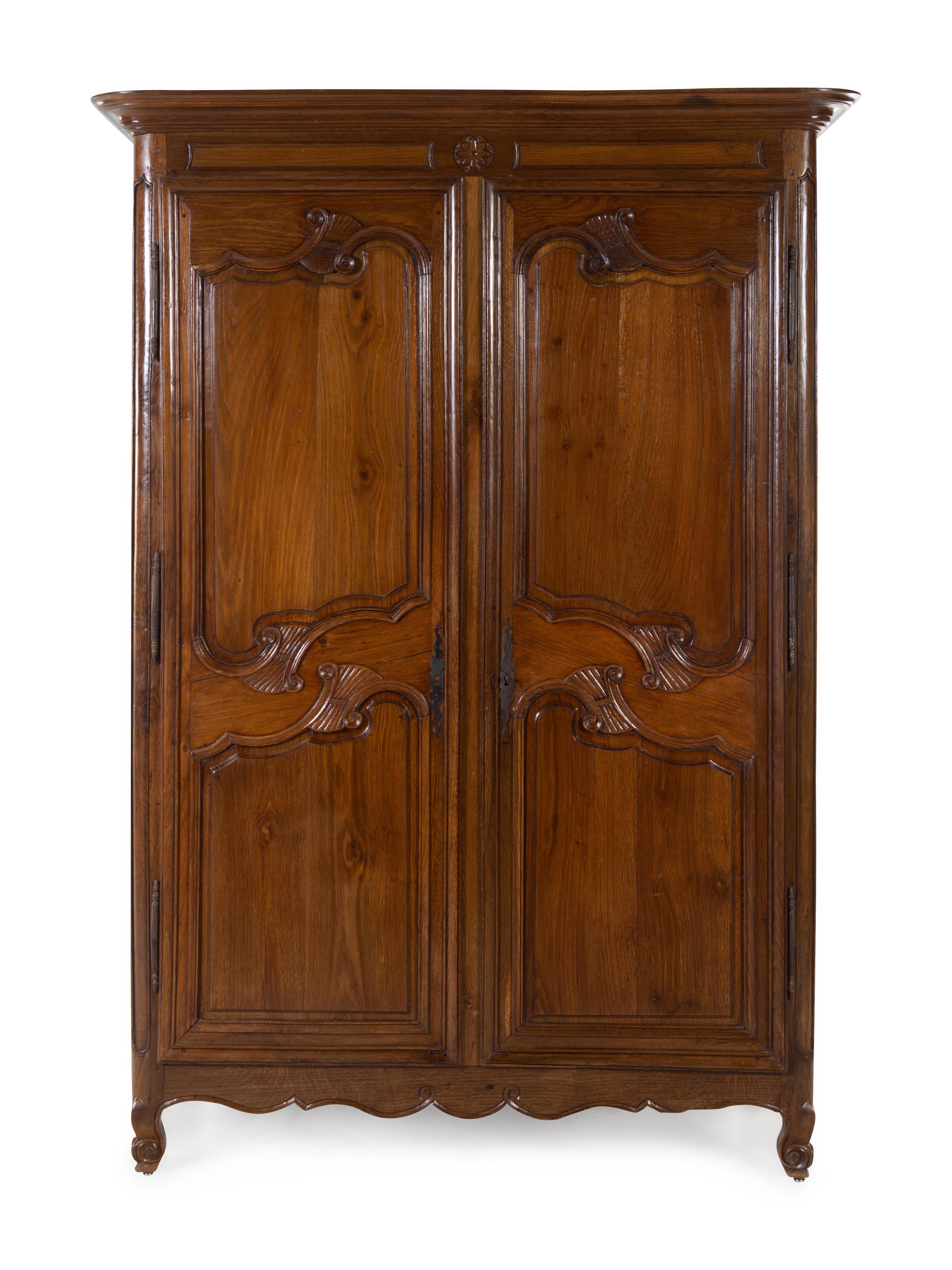 A French Provincial Walnut Armoire