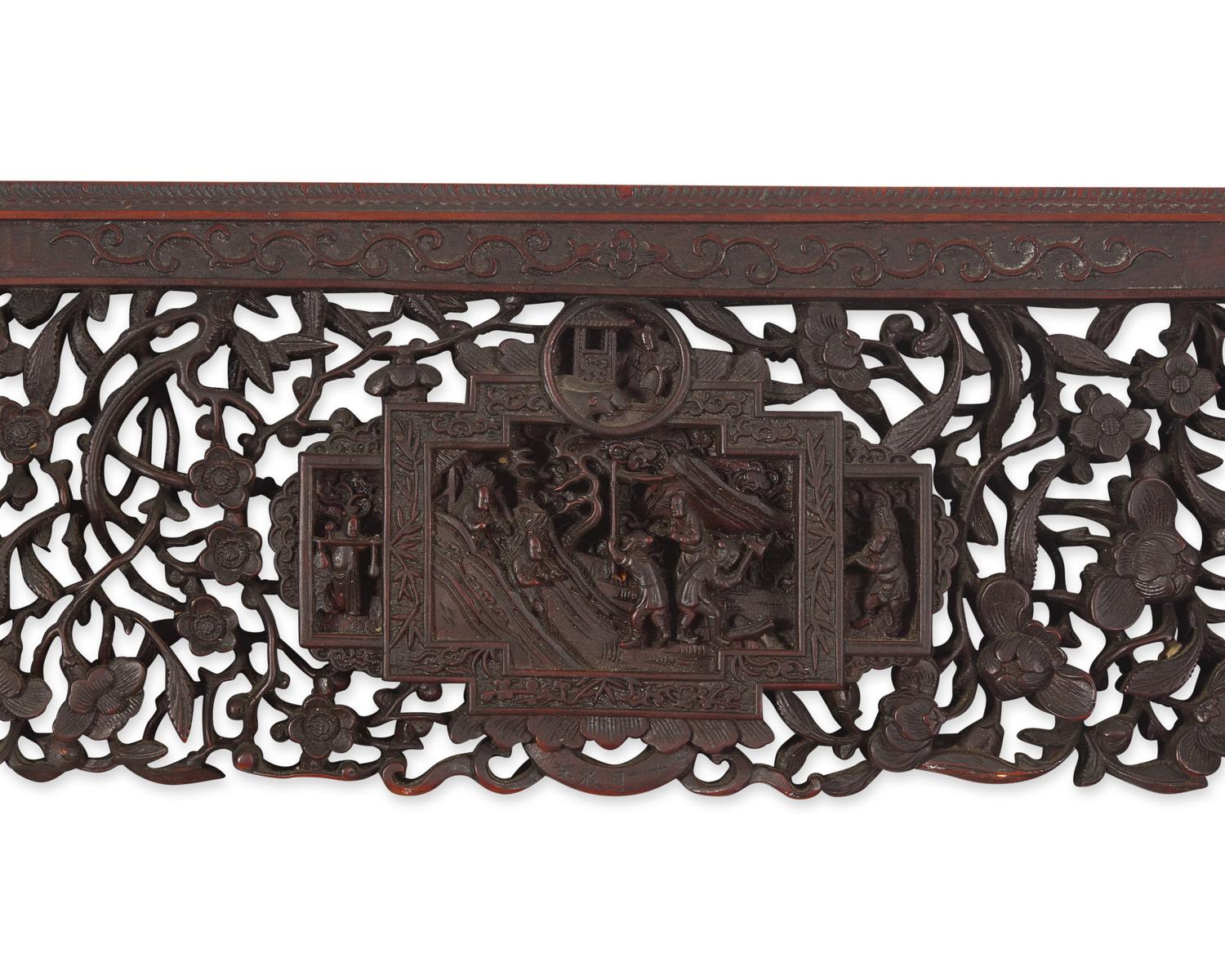 A large and impressive Chinese export carved and pierced stained wood frame, 19th century