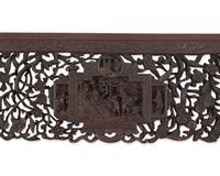 A large and impressive Chinese export carved and pierced stained wood frame, 19th century