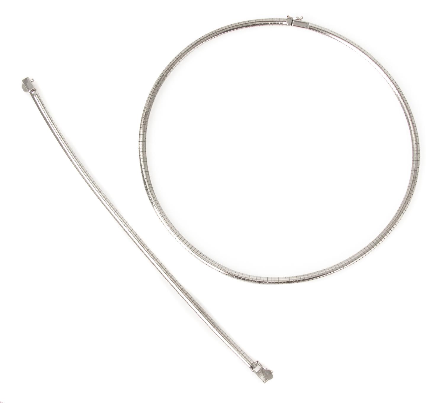 An 18 Karat White Gold Omega Chain Demi Parure, Italy, 22.80 dwts.