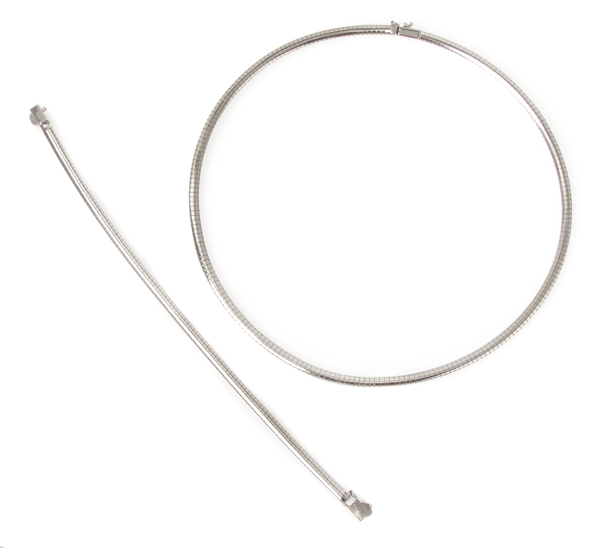 An 18 Karat White Gold Omega Chain Demi Parure, Italy, 22.80 dwts.