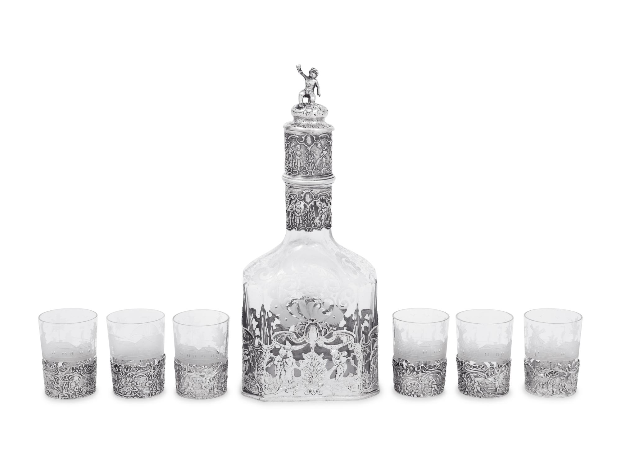 A Continental Silver Mounted Etched Glass Drink Service