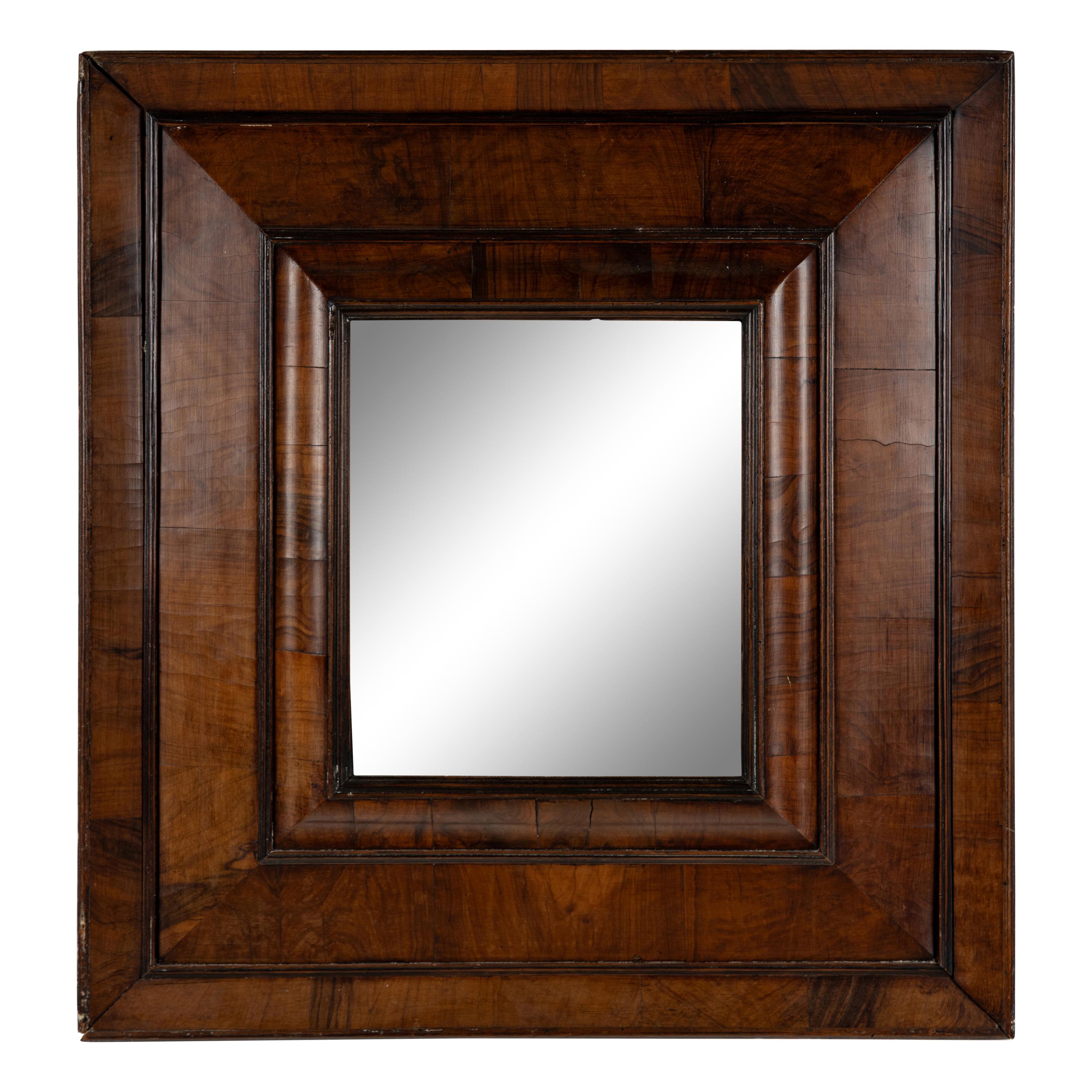 A Continental Walnut Mirror