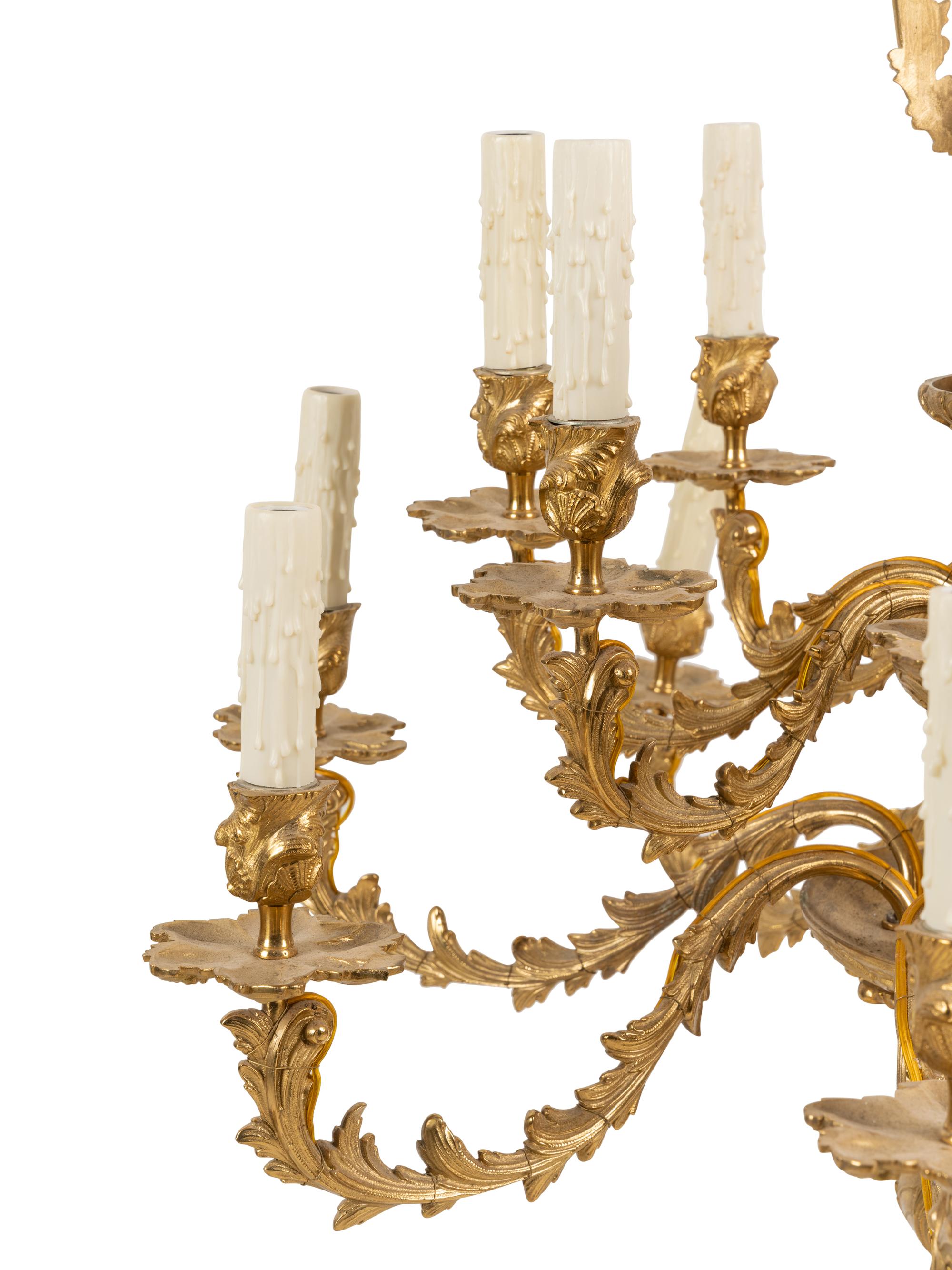 A Pair of Louis XV Style Gilt Bronze Sixteen-Light Chandeliers