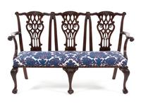 A Chippendale Style Mahogany Triple Back Settee Height 38 1/2 x width 62 inches x depth 21 1/2 inches. — 20TH CENTURY