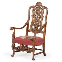 A Renaissance Revival Carved Hall Chair in Walnut with Shell-Form Crest and Pierced Back Splat