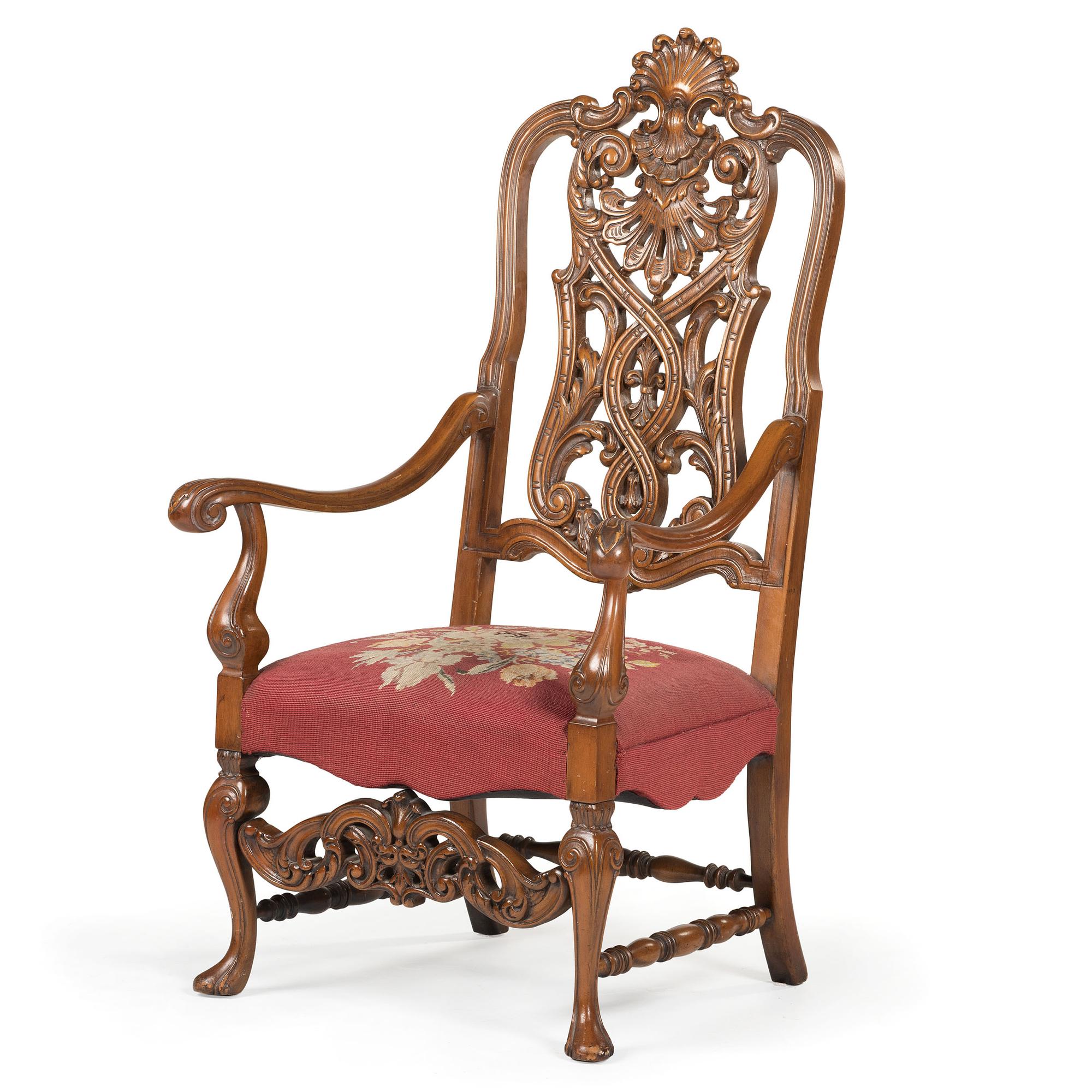 A Renaissance Revival Carved Hall Chair in Walnut with Shell-Form Crest and Pierced Back Splat