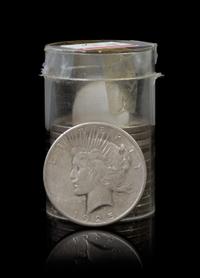A Group of Thirteen United States Peace Silver Dollars