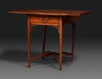 A Late Chippendale Carved Cherrywood Stretcher-Base Pembroke Table