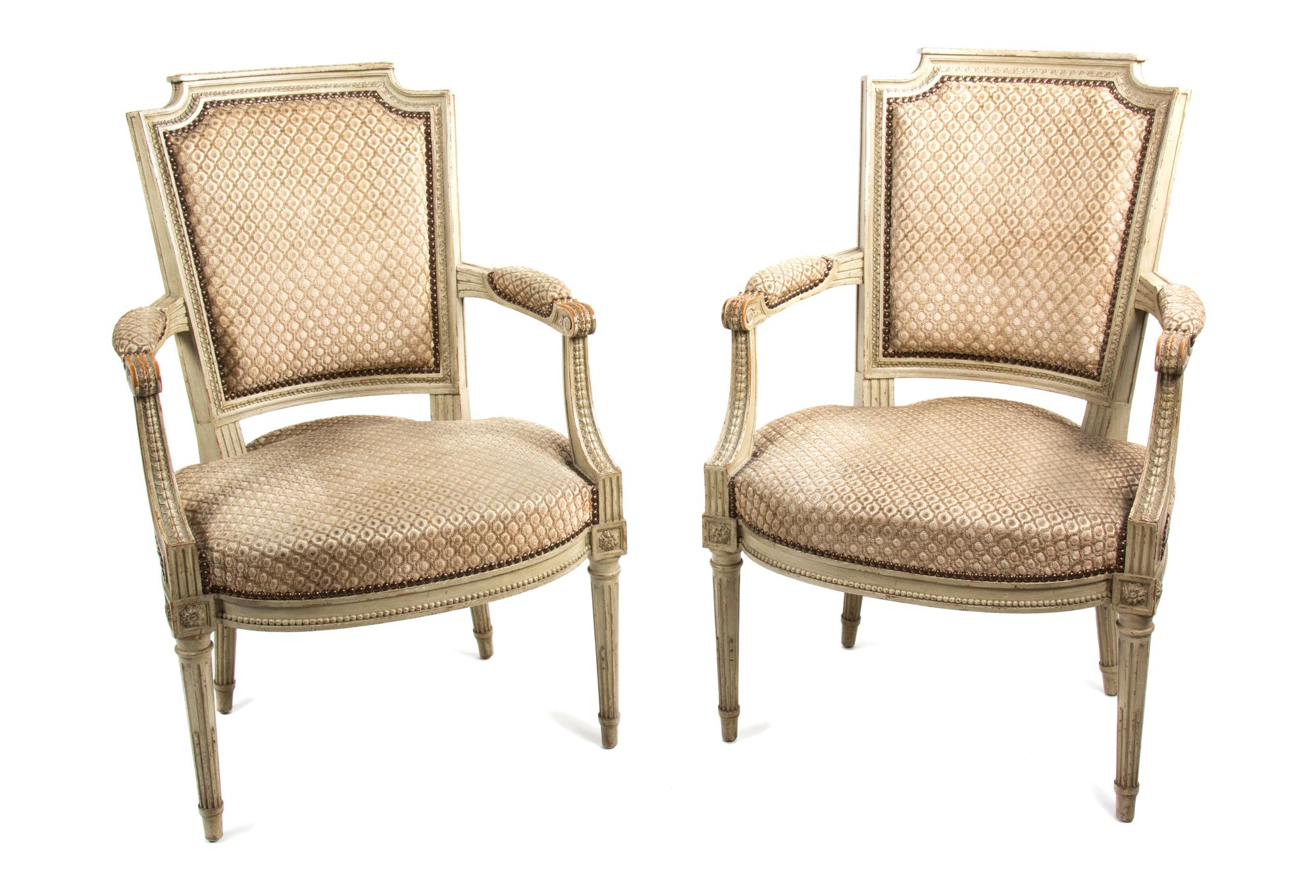 A Pair of Louis XVI Style Painted Fauteuils Height 34 inches. — 19TH CENTURY