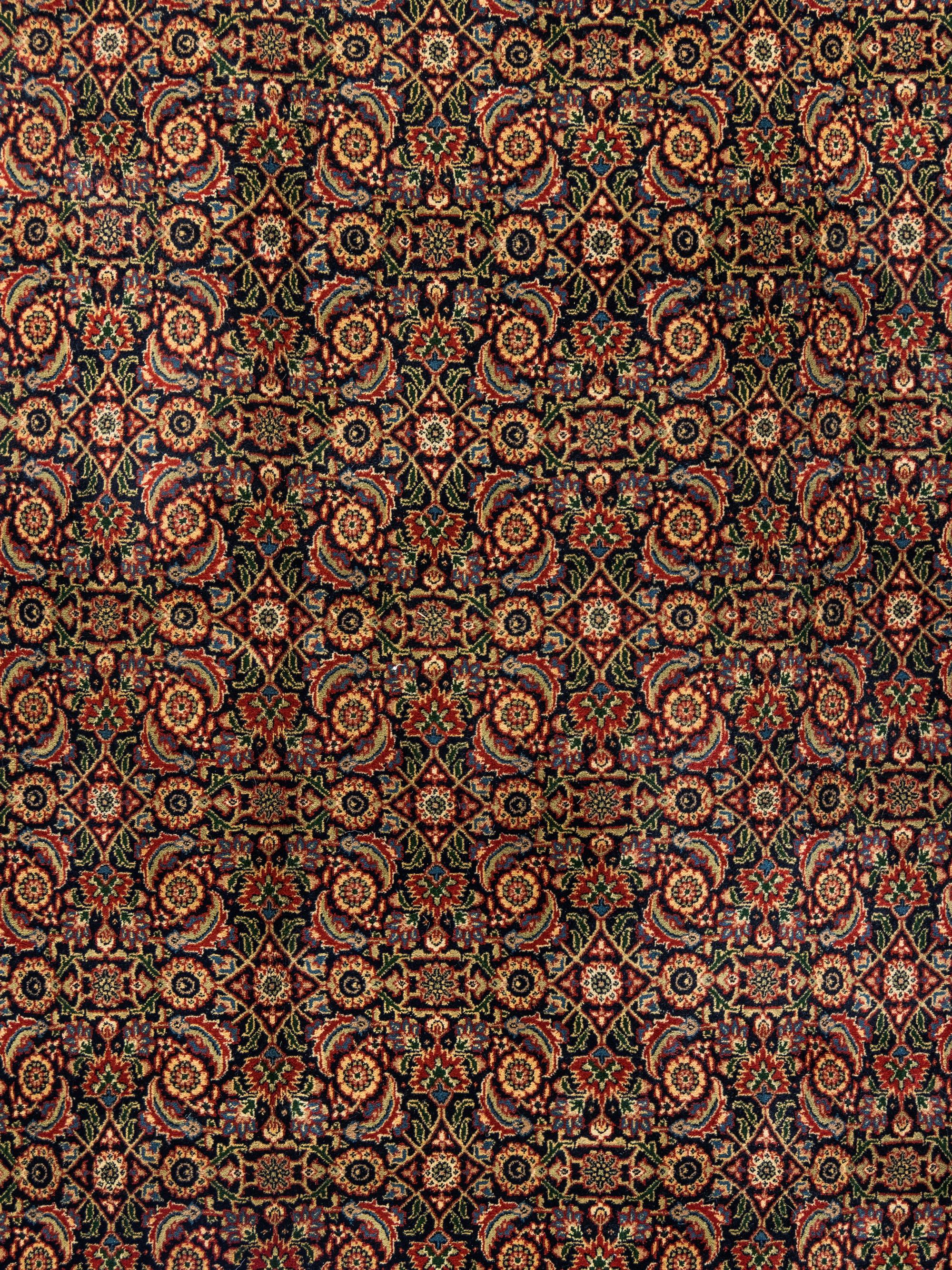 A Persian Meshed Wool Rug
