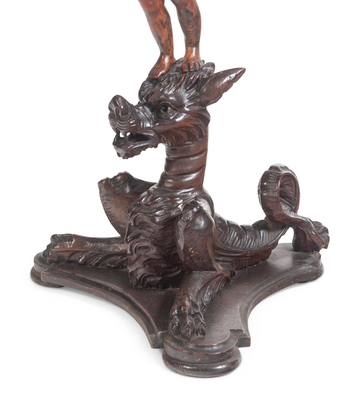 A Venetian Carved Walnut Figural Table