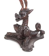A Venetian Carved Walnut Figural Table