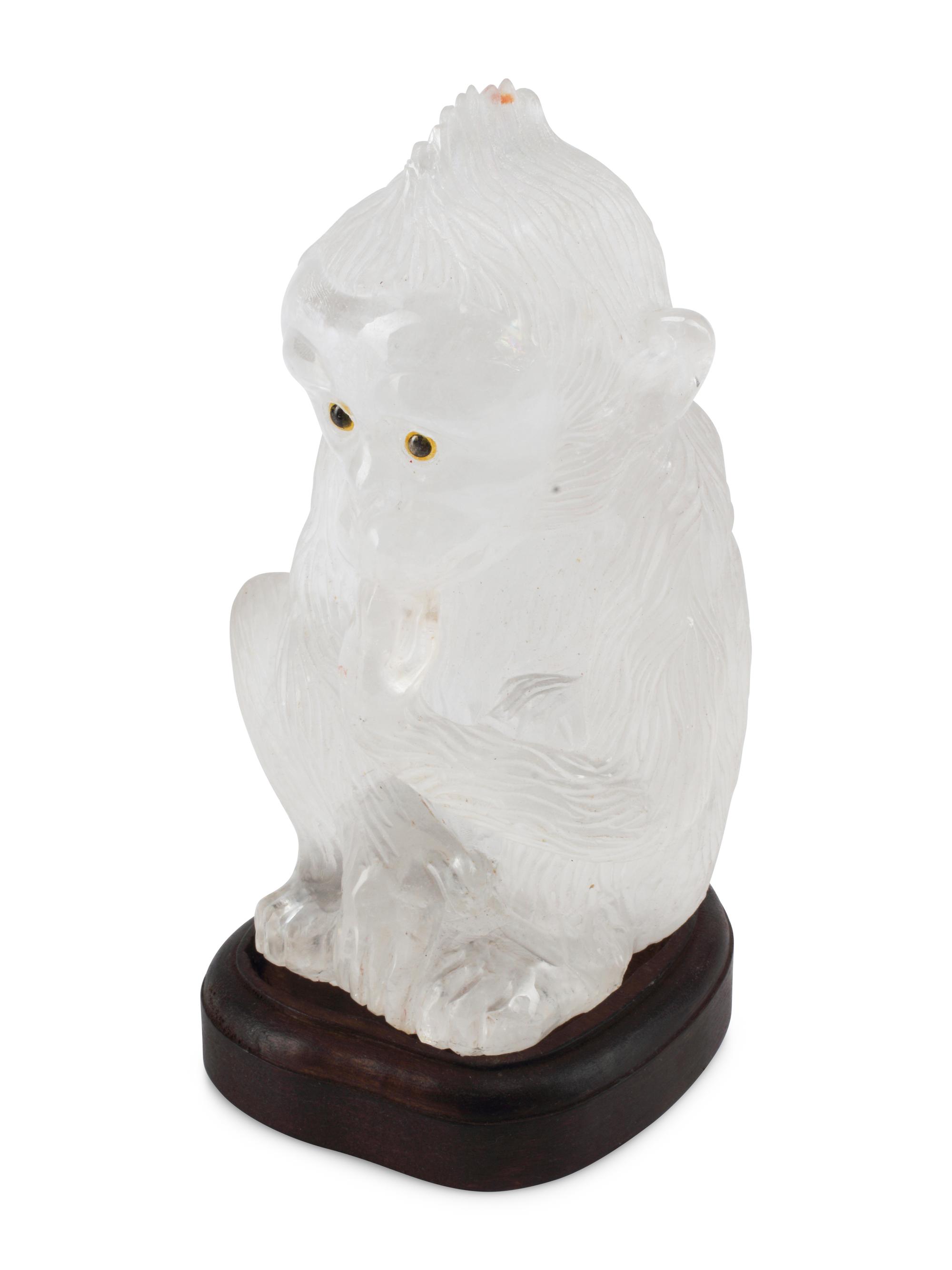 A Carved Rock Crystal Model of a Seated Monkey