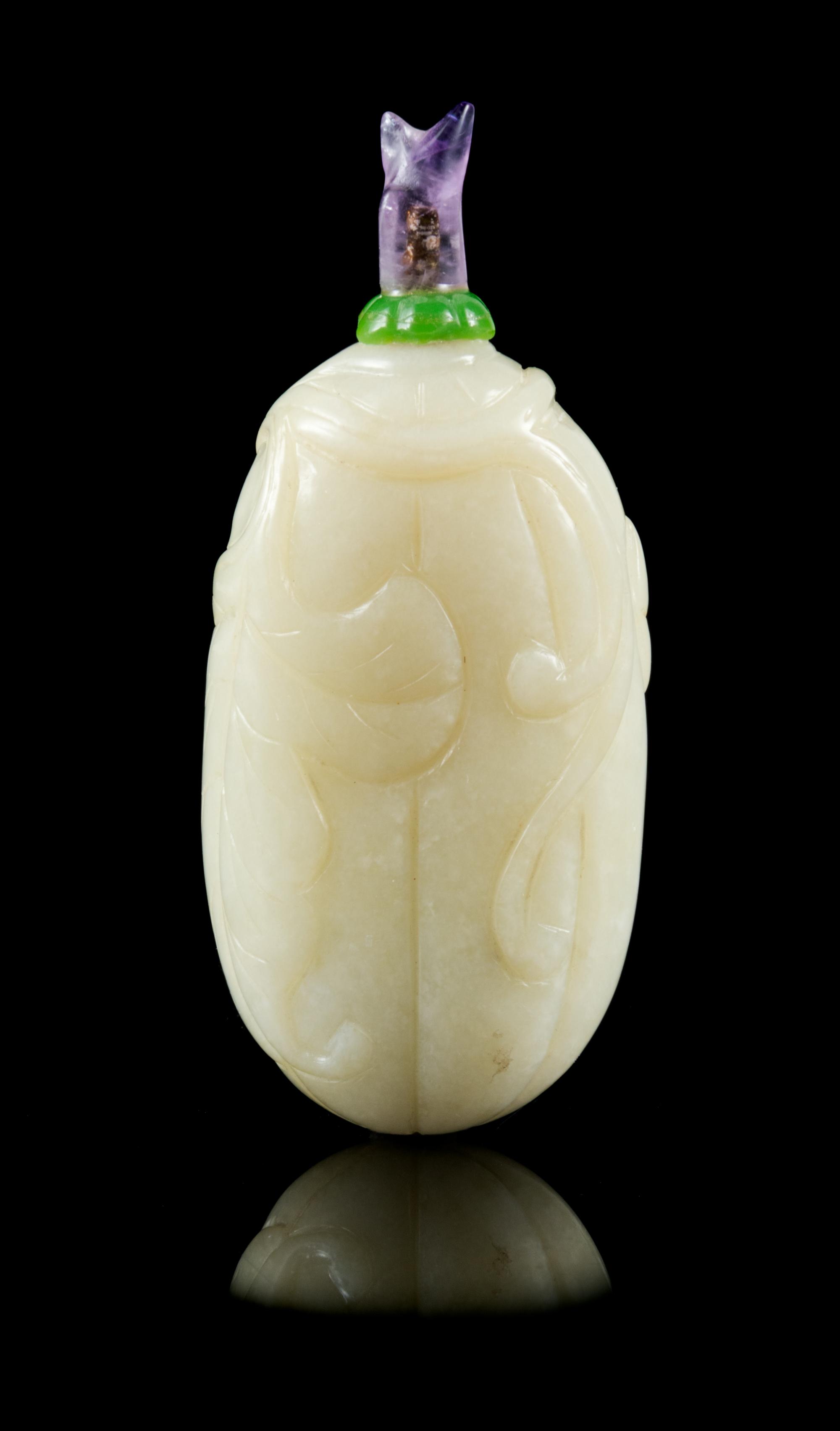 A Mottled White Jade Snuff Bottle Height 3 1/4 inches. — 19TH CENTURY