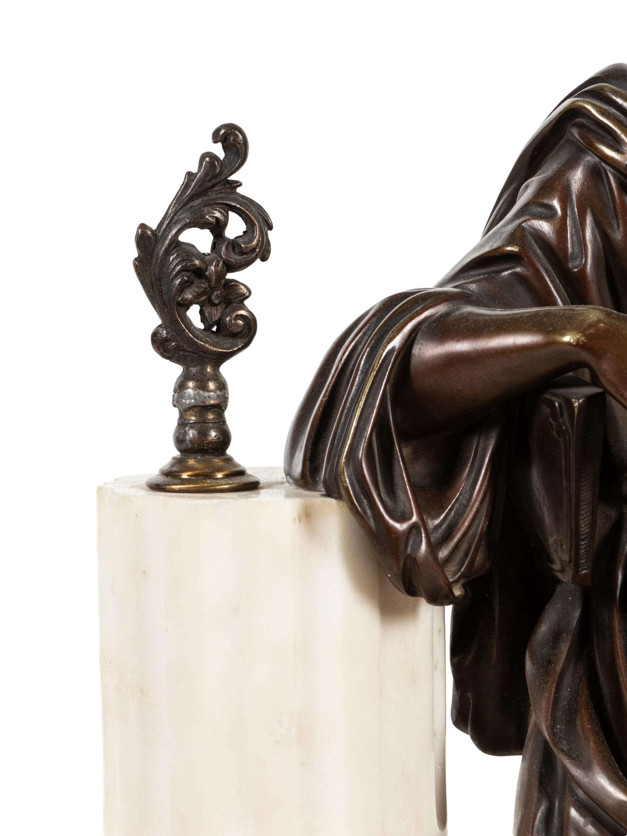 A French Gilt and Patinated Bronze Mounted Marble Mantel Clock