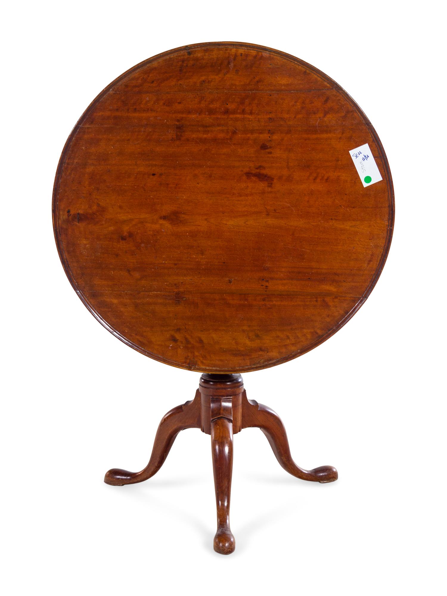 A Queen Anne Style Mahogany Tilt-Top Tripod Table
