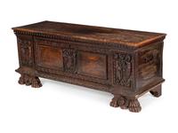 An Italian Carved Walnut Cassone