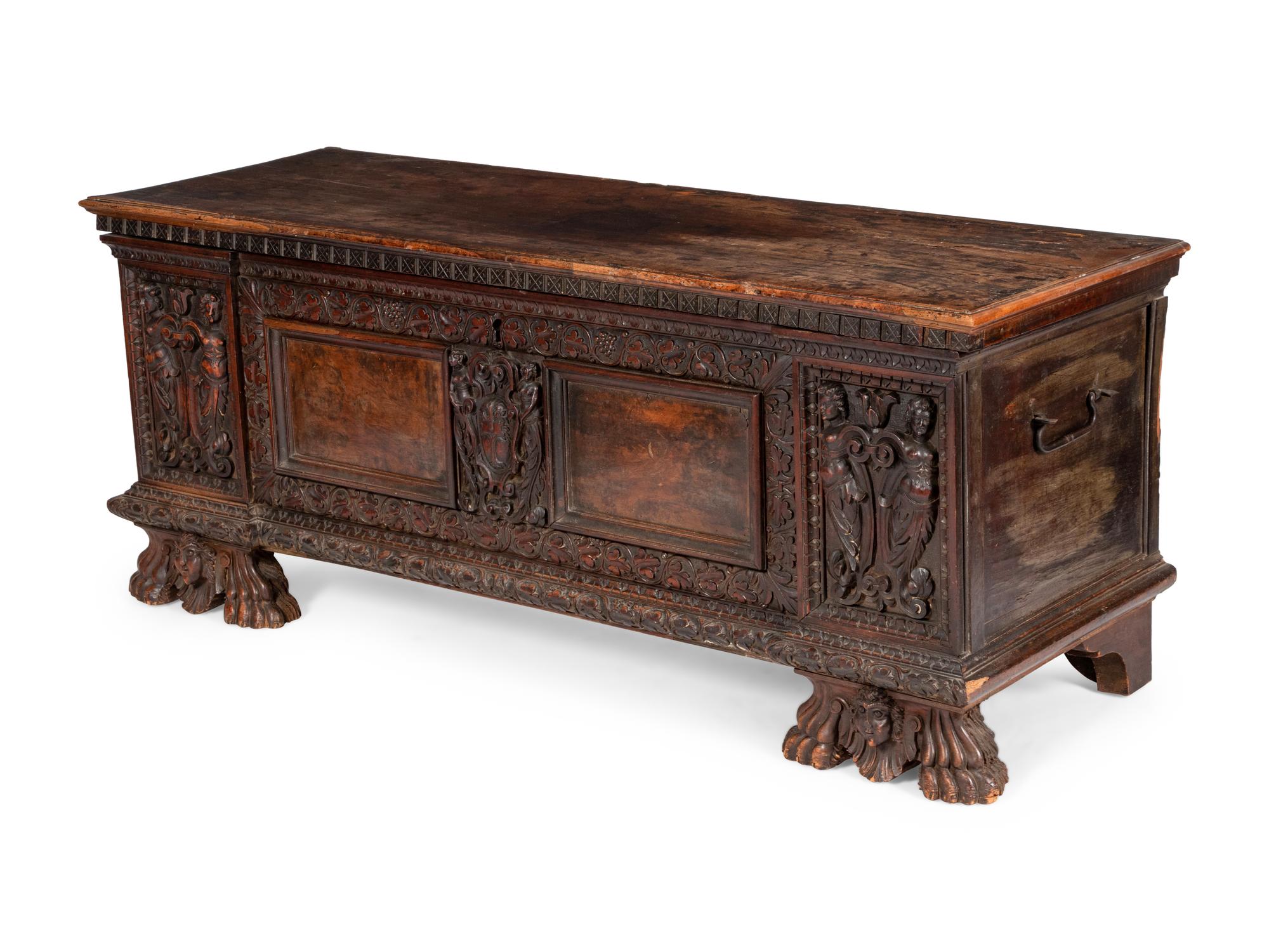 An Italian Carved Walnut Cassone