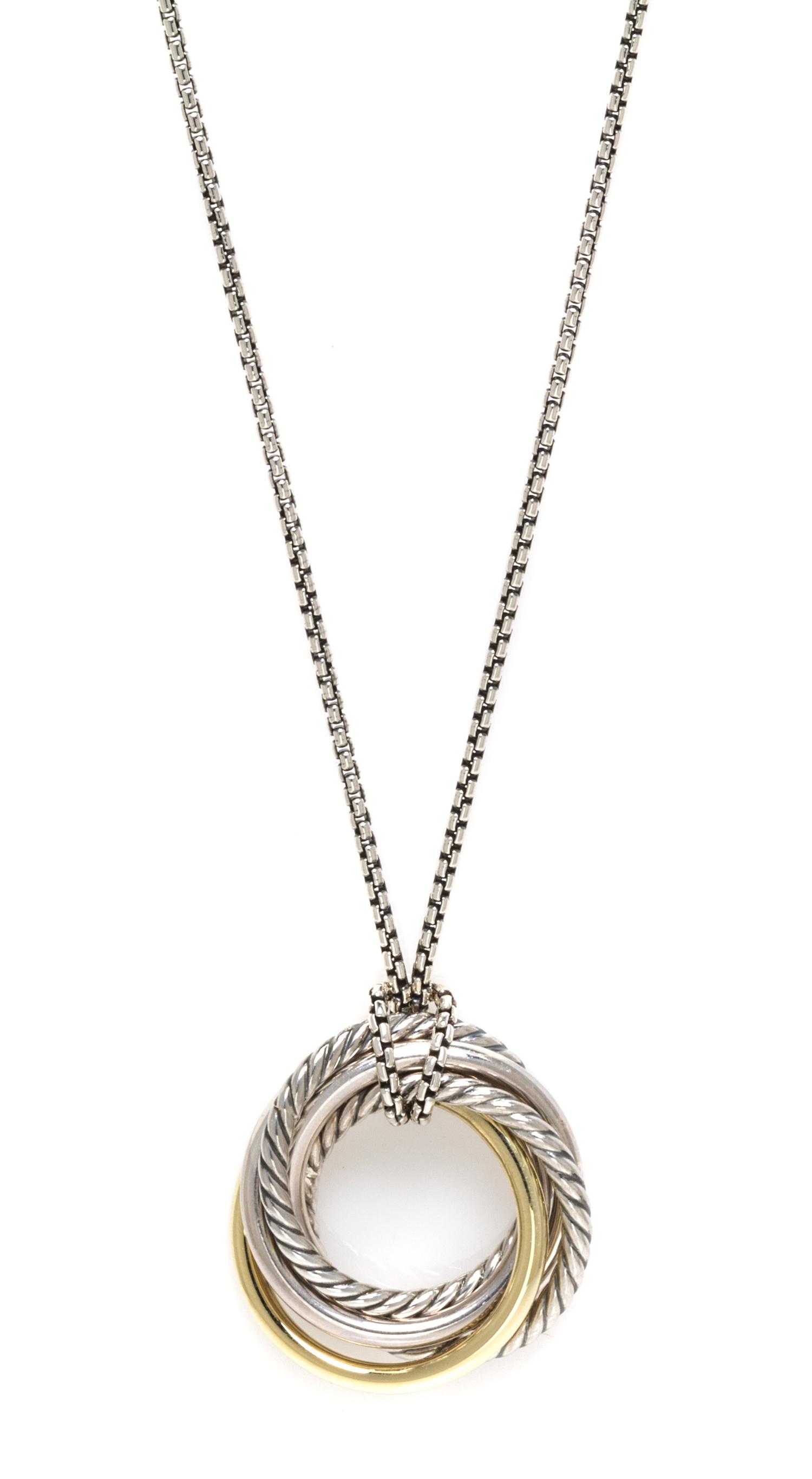 A Sterling Silver and 14 Karat Bonded Yellow Gold Crossover Pendant and Chain, David Yurman, 20.10 dwts.